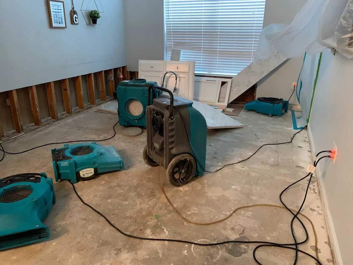 Dehumidifier in flood-cut room for Water Damage Restoration in Pleasant View